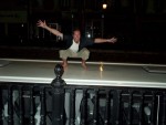 And Pose on the Roof of Someone's Tour Bus