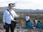 Marc playing air guitar at the top of Pyramida del Sol